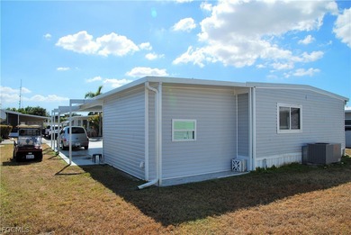 Updates galore in this turnkey retreat located in Six Lakes on Six Lakes Country Club in Florida - for sale on GolfHomes.com, golf home, golf lot