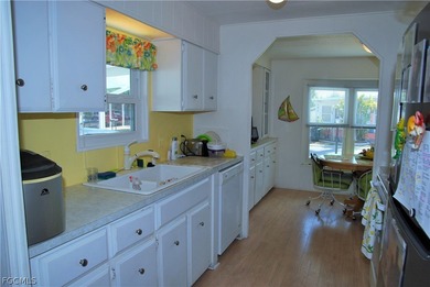 Updates galore in this turnkey retreat located in Six Lakes on Six Lakes Country Club in Florida - for sale on GolfHomes.com, golf home, golf lot