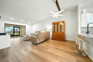 Welcome to this beautifully remodeled villa in the heart of Palm on Highland Lakes Executive Golf Course in Florida - for sale on GolfHomes.com, golf home, golf lot