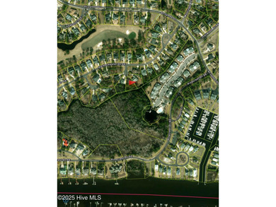 Exceptional .42-acre homesite at the end of a quiet cul-de-sac on Members Club At St. James Plantation in North Carolina - for sale on GolfHomes.com, golf home, golf lot