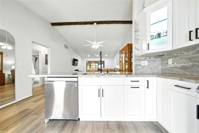 Welcome to this beautifully remodeled villa in the heart of Palm on Highland Lakes Executive Golf Course in Florida - for sale on GolfHomes.com, golf home, golf lot