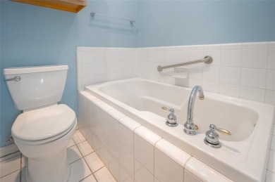 This fantastic condo in a gated community is ready for you to on The Greens Country Club in Oklahoma - for sale on GolfHomes.com, golf home, golf lot