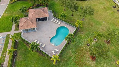 Its all about the view! Discover peaceful, resort-style living on Gateway Golf and Country Club in Florida - for sale on GolfHomes.com, golf home, golf lot