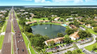 Welcome to this beautifully remodeled villa in the heart of Palm on Highland Lakes Executive Golf Course in Florida - for sale on GolfHomes.com, golf home, golf lot