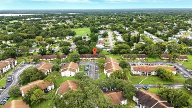 Welcome to this beautifully remodeled villa in the heart of Palm on Highland Lakes Executive Golf Course in Florida - for sale on GolfHomes.com, golf home, golf lot