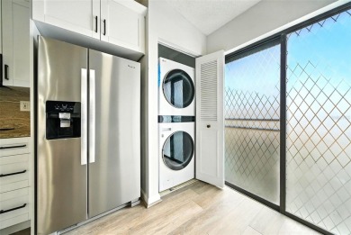 Welcome to this beautifully remodeled villa in the heart of Palm on Highland Lakes Executive Golf Course in Florida - for sale on GolfHomes.com, golf home, golf lot