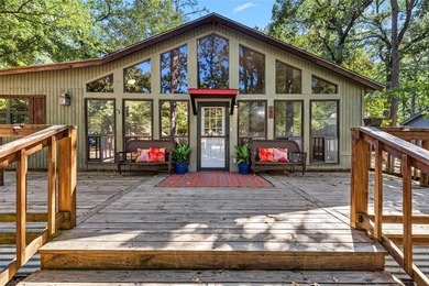 Welcome home to a warm and inviting retreat tucked away among on Holly Lake Ranch Golf Club in Texas - for sale on GolfHomes.com, golf home, golf lot