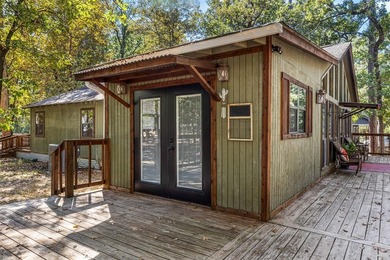 Welcome home to a warm and inviting retreat tucked away among on Holly Lake Ranch Golf Club in Texas - for sale on GolfHomes.com, golf home, golf lot
