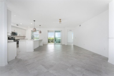 This coach home strikes the perfect balance between condo on Heritage Landing Golf  in Florida - for sale on GolfHomes.com, golf home, golf lot