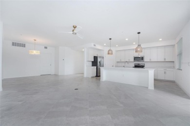 This coach home strikes the perfect balance between condo on Heritage Landing Golf  in Florida - for sale on GolfHomes.com, golf home, golf lot