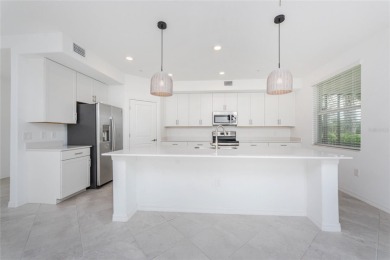 This coach home strikes the perfect balance between condo on Heritage Landing Golf  in Florida - for sale on GolfHomes.com, golf home, golf lot