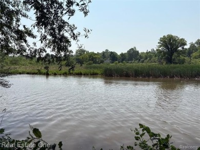 **Investment Opportunity** VALUE IS IN THE LAND! - Here is your on Kearsley Lake Golf Course in Michigan - for sale on GolfHomes.com, golf home, golf lot
