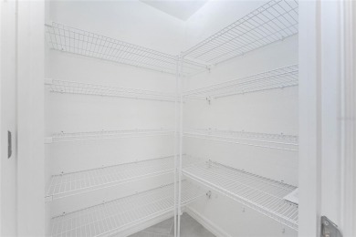 This coach home strikes the perfect balance between condo on Heritage Landing Golf  in Florida - for sale on GolfHomes.com, golf home, golf lot