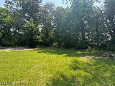 **Investment Opportunity** VALUE IS IN THE LAND! - Here is your on Kearsley Lake Golf Course in Michigan - for sale on GolfHomes.com, golf home, golf lot