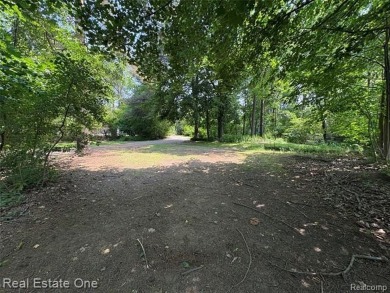 **Investment Opportunity** VALUE IS IN THE LAND! - Here is your on Kearsley Lake Golf Course in Michigan - for sale on GolfHomes.com, golf home, golf lot