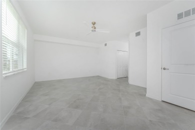 This coach home strikes the perfect balance between condo on Heritage Landing Golf  in Florida - for sale on GolfHomes.com, golf home, golf lot