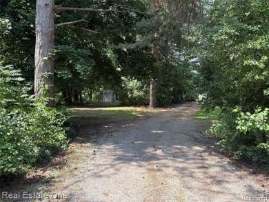 **Investment Opportunity** VALUE IS IN THE LAND! - Here is your on Kearsley Lake Golf Course in Michigan - for sale on GolfHomes.com, golf home, golf lot