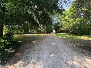 **Investment Opportunity** VALUE IS IN THE LAND! - Here is your on Kearsley Lake Golf Course in Michigan - for sale on GolfHomes.com, golf home, golf lot