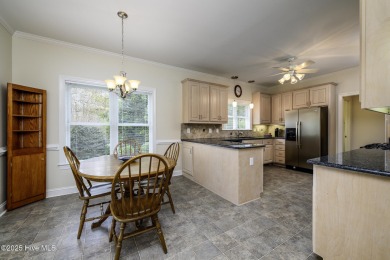 Over 3,000 square feet of living space, this 3-bedroom, 2.5-bath on Taberna Country Club in North Carolina - for sale on GolfHomes.com, golf home, golf lot