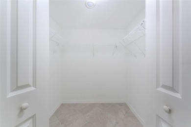 This coach home strikes the perfect balance between condo on Heritage Landing Golf  in Florida - for sale on GolfHomes.com, golf home, golf lot