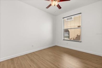 Discover this beautifully updated 4-bedroom home set along the on MetroWest Golf Club in Florida - for sale on GolfHomes.com, golf home, golf lot