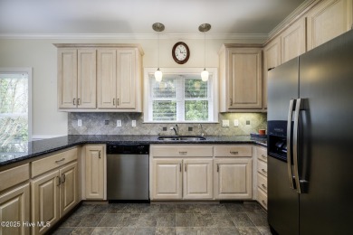 Over 3,000 square feet of living space, this 3-bedroom, 2.5-bath on Taberna Country Club in North Carolina - for sale on GolfHomes.com, golf home, golf lot