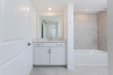 This coach home strikes the perfect balance between condo on Heritage Landing Golf  in Florida - for sale on GolfHomes.com, golf home, golf lot