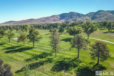 Superb custom home in one of the best golf course locations in on Hidden Valley Country Club in Nevada - for sale on GolfHomes.com, golf home, golf lot