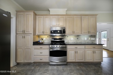 Over 3,000 square feet of living space, this 3-bedroom, 2.5-bath on Taberna Country Club in North Carolina - for sale on GolfHomes.com, golf home, golf lot