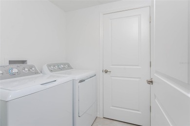 This coach home strikes the perfect balance between condo on Heritage Landing Golf  in Florida - for sale on GolfHomes.com, golf home, golf lot