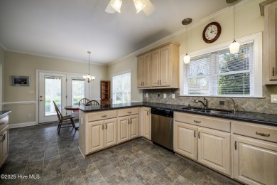 Over 3,000 square feet of living space, this 3-bedroom, 2.5-bath on Taberna Country Club in North Carolina - for sale on GolfHomes.com, golf home, golf lot