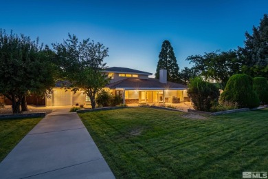 Superb custom home in one of the best golf course locations in on Hidden Valley Country Club in Nevada - for sale on GolfHomes.com, golf home, golf lot