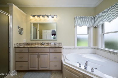 Over 3,000 square feet of living space, this 3-bedroom, 2.5-bath on Taberna Country Club in North Carolina - for sale on GolfHomes.com, golf home, golf lot