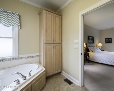 Over 3,000 square feet of living space, this 3-bedroom, 2.5-bath on Taberna Country Club in North Carolina - for sale on GolfHomes.com, golf home, golf lot