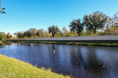 Discover the beauty of waterfront living in this stunning on LPGA International Golf Course in Florida - for sale on GolfHomes.com, golf home, golf lot
