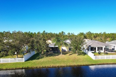 Discover the beauty of waterfront living in this stunning on LPGA International Golf Course in Florida - for sale on GolfHomes.com, golf home, golf lot