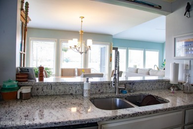 Welcome to this gorgeous, modernized end-unit = 109 Egret Ct on Olde Point Golf and Country Club in North Carolina - for sale on GolfHomes.com, golf home, golf lot