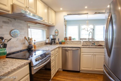 Welcome to this gorgeous, modernized end-unit = 109 Egret Ct on Olde Point Golf and Country Club in North Carolina - for sale on GolfHomes.com, golf home, golf lot