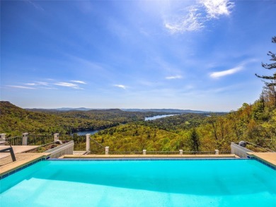 Welcome to your perfect mountain escape--an Al Platt designed on Lake Toxaway Country Club in North Carolina - for sale on GolfHomes.com, golf home, golf lot