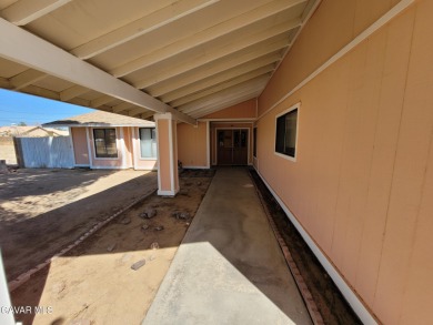 Large and spacious home with 3 BR/ 2 Ba, office, indoor laundry on Tierra Del Sol Golf Course in California - for sale on GolfHomes.com, golf home, golf lot