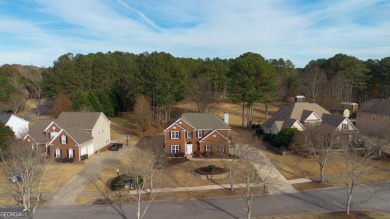Tee off your day just steps from home in this family-friendly on Bear Creek Golf Club Inc in Georgia - for sale on GolfHomes.com, golf home, golf lot