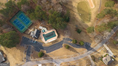 Tee off your day just steps from home in this family-friendly on Bear Creek Golf Club Inc in Georgia - for sale on GolfHomes.com, golf home, golf lot
