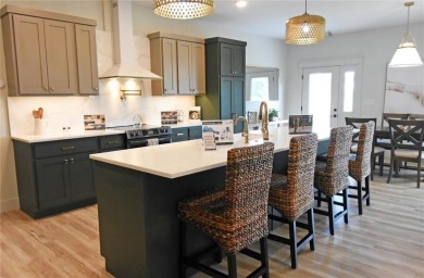 This stunning, Model Home and Parade Home, is a Platinum on Hunters Ridge Golf Course in Iowa - for sale on GolfHomes.com, golf home, golf lot