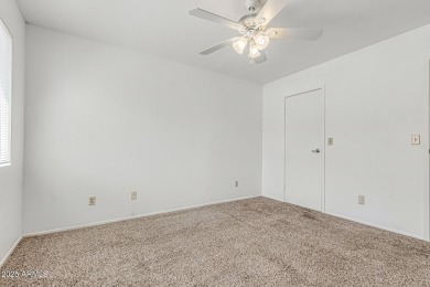 Welcome home to this charming 2-bedroom, 1.5-bath townhome on Raven Golf Club At South Mountain in Arizona - for sale on GolfHomes.com, golf home, golf lot