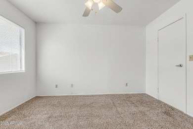 Welcome home to this charming 2-bedroom, 1.5-bath townhome on Raven Golf Club At South Mountain in Arizona - for sale on GolfHomes.com, golf home, golf lot