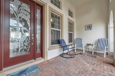 This exquisite home is situated in the award-winning Pelican on Pelican Preserve Golf Club in Florida - for sale on GolfHomes.com, golf home, golf lot