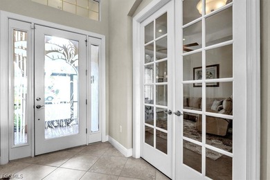 This exquisite home is situated in the award-winning Pelican on Pelican Preserve Golf Club in Florida - for sale on GolfHomes.com, golf home, golf lot