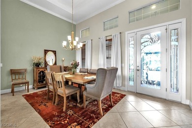 This exquisite home is situated in the award-winning Pelican on Pelican Preserve Golf Club in Florida - for sale on GolfHomes.com, golf home, golf lot