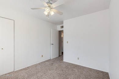 Welcome home to this charming 2-bedroom, 1.5-bath townhome on Raven Golf Club At South Mountain in Arizona - for sale on GolfHomes.com, golf home, golf lot
