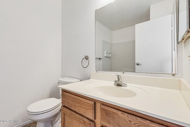 Welcome home to this charming 2-bedroom, 1.5-bath townhome on Raven Golf Club At South Mountain in Arizona - for sale on GolfHomes.com, golf home, golf lot